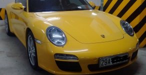 Porsche 911 Carrera 2008 - Bán xe thể thao Porsche 911 Carrera đời 2008, màu vàng cực đẹp rất ít đi giá 2 tỷ 400 tr tại Hà Nội