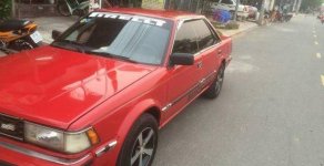 Nissan Bluebird MT 1990 - Chính chủ bán Nissan Bluebird MT đời 1990, màu đỏ giá 56 triệu tại Đồng Tháp