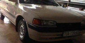 Mazda 323  MT 1995 - Chính chủ bán Mazda 323 MT đời 1995, màu trắng giá 100 triệu tại Tây Ninh