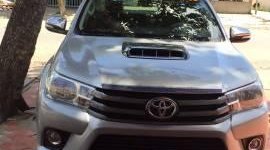 Toyota Hilux 2015 - Gia đình bán xe Toyota Hilux đời 2015, màu bạc giá 590 triệu tại Tiền Giang