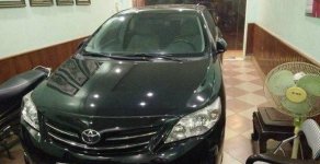 Toyota Corolla 2013 - Cần bán lại xe Toyota Corolla năm 2013, màu đen chính chủ giá 630 triệu tại Hà Nội