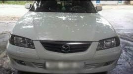 Mazda 626   2002 - Cần bán lại xe Mazda 626 đời 2002, màu trắng giá 169 triệu tại An Giang