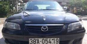 Mazda 626   2001 - Bán ô tô Mazda 626 đời 2001, màu đen chính chủ giá 142 triệu tại Ninh Bình