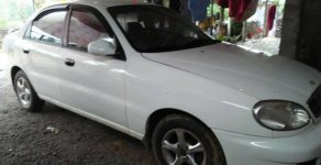 Daewoo Lanos 2002 - Cần bán lại xe Daewoo Lanos 2002, màu trắng giá 100 triệu tại Quảng Bình