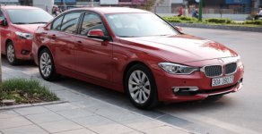 BMW 3 Series 328i 2012 - Cần bán lại xe BMW 3 Series 328i đời 2012, màu đỏ xe gia đình giá 920 triệu tại Hà Nội