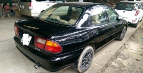 Mazda 323F 2001 - Cần bán xe Mazda 323F đời 2001, màu đen, giá 125tr giá 125 triệu tại An Giang