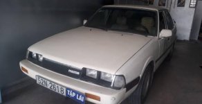 Mazda 323 1992 - Bán Mazda 323 đời 1992, màu trắng giá 40 triệu tại Hậu Giang