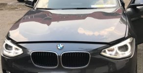 BMW 1 Series 116i 2014 - Cần bán xe BMW 1 Series 116i năm 2014, màu xám, xe nhập chính chủ giá 920 triệu tại Tp.HCM