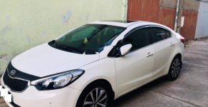 Kia K3 2.0 2014 - Bán Kia K3 2.0 đời 2014, màu trắng chính chủ giá 560 triệu tại Tiền Giang