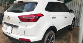 Hyundai Creta 2015 - Cần bán lại xe Hyundai Creta đời 2015, màu trắng, nhập khẩu chính hãng, còn mới, 700 triệu giá 700 triệu tại Bình Dương