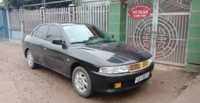 Mitsubishi Lancer 2001 - Bán Mitsubishi Lancer sản xuất 2001, màu đen số sàn giá 108 triệu tại Thái Bình