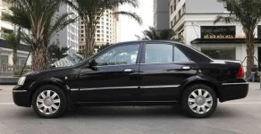 Ford Laser   Deluxe MT  2006 - Cần bán lại xe Ford Laser Deluxe MT năm 2006, màu đen như mới, giá 248tr giá 248 triệu tại Hà Nội