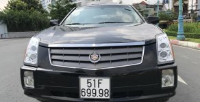 Cadillac SRX 2007 - Bán xe Cadillac SRX ĐK 2007, nhập Mỹ 8 chỗ, màu đen. Xe loại cao cấp hàng full đủ đồ chơi, gầm cao giá 578 triệu tại Tp.HCM