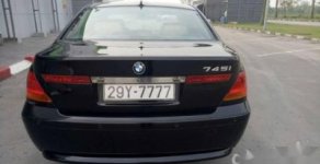 BMW 7 Series 745i 2004 - Cần bán BMW 7 Series 745i đời 2004, màu đen, nhập khẩu nguyên chiếc chính chủ, giá tốt giá 386 triệu tại Tp.HCM
