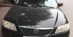 Mazda 323 2002 - Bán xe Mazda 323 sản xuất 2002, màu đen giá 120 triệu tại Vĩnh Phúc