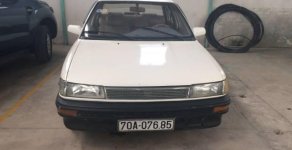 Toyota Corolla altis 1989 - Cần bán lại xe Toyota Corolla altis đời 1989, màu trắng giá 85 triệu tại Bình Dương