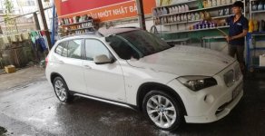 BMW X1 2011 - Chính chủ cần bán gấp BMW X1 2011, màu trắng, bảo dưỡng tốt giá 620 triệu tại Tp.HCM
