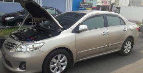 Toyota Corolla altis G 2014 - Bán Toyota Corolla altis G năm sản xuất 2014, màu vàng chính chủ giá cạnh tranh giá 605 triệu tại Bình Dương