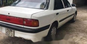 Mazda 323 1996 - Bán Mazda 323 sản xuất năm 1996, màu trắng  giá 45 triệu tại Bình Phước