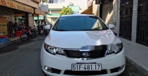 Kia Forte   AT 2012 - Chính chủ bán Kia Forte AT năm 2012, màu trắng  giá 450 triệu tại Tp.HCM