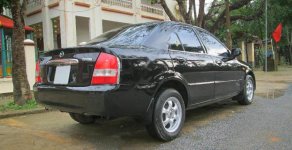 Mazda 323 GLX 2003 - Cần bán Mazda 323 GLX sản xuất năm 2003, màu đen chính chủ, giá tốt giá 145 triệu tại Thanh Hóa