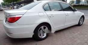 BMW 5 Series   523i  2009 - Bán BMW 5 Series 523i đời 2009, màu trắng chính chủ, 688 triệu giá 688 triệu tại Hà Nội