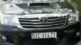 Toyota Hilux 2013 - Bán xe Toyota Hilux 2013, màu đen giá 495 triệu tại Quảng Nam