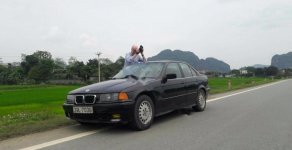 BMW 3 Series 320i 1997 - Bán xe BMW 3 Series 320i năm 1997, màu đen, xe nhập  giá 60 triệu tại Thanh Hóa