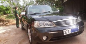 Ford Laser 2004 - Cần bán lại xe Ford Laser sản xuất 2004, màu đen chính chủ, 245 triệu giá 245 triệu tại Nghệ An