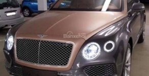 Bentley Bentayga 2018 - Bán xe Bentley Bentayga 4.0L sản xuất năm 2018, màu vàng cát và xám tôn, xe nhập Mỹ giá 16 tỷ 262 tr tại Hà Nội