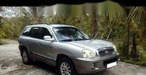 Hyundai Santa Fe   2003 - Chính chủ cần bán Hyundai Santa Fe đời 2003, màu bạc giá 270 triệu tại Khánh Hòa