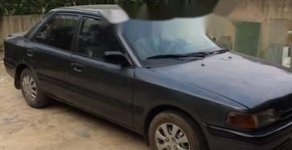Mazda 323 1993 - Cần bán lại xe Mazda 323 đời 1993, màu đen, 40 triệu giá 40 triệu tại Tuyên Quang