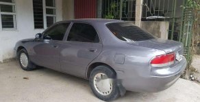 Mazda 626 1997 - Cần bán lại xe Mazda 626 năm sản xuất 1997, màu xám xe gia đình giá 95 triệu tại Ninh Bình