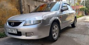 Mazda 323 2004 - Bán Mazda 323 2004, màu bạc xe gia đình   giá 170 triệu tại Quảng Nam