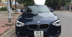 BMW 1 Series 116i 2014 - Cần bán BMW 1 Series 116i sản xuất 2014, màu xanh lam, xe nhập giá 885 triệu tại Bình Dương