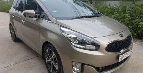 Kia Rondo DAT 2015 - Bán Kia Rondo DAT sản xuất năm 2015, màu vàng cát giá 635 triệu tại Hà Nội