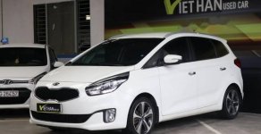 Kia Rondo   2.0AT  2014 - Cần bán Kia Rondo 2.0AT năm 2014, màu trắng, giá 558tr giá 558 triệu tại Tp.HCM