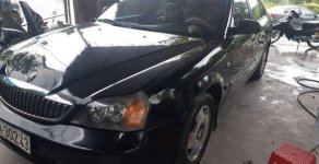 Daewoo Magnus 2004 - Bán Daewoo Magnus đời 2004, màu đen, nhập khẩu   giá 135 triệu tại Bình Dương