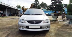Mazda 323 2003 - Cần bán lại xe Mazda 323 đời 2003, màu bạc xe gia đình giá 205 triệu tại Tiền Giang
