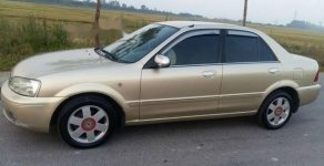 Ford Laser  1.8MT 2003 - Cần bán Ford Laser 1.8MT năm 2003, màu vàng chính chủ giá cạnh tranh giá 185 triệu tại Nghệ An