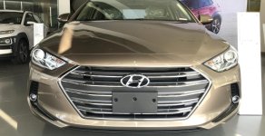 Hyundai Elantra 1.6 AT 2018 - Cần bán gấp Hyundai Elantra năm 2018 màu kem (Be), 549 triệu tại Quảng Bình giá 549 triệu tại Quảng Bình