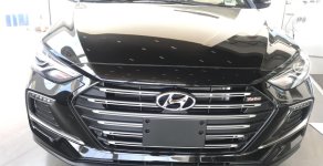 Hyundai Elantra 1.6 Tubo 2018 - Cần bán lại xe Hyundai Elantra đời 2018 màu đen, giá 729 triệu, xe có sẵn giao ngay giá 729 triệu tại Quảng Bình