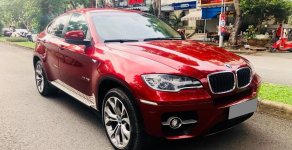 BMW X6 xDrive50i 2010 - Bán BMW X6 đỏ sx 2010, xe nguyên đai nguyên kiện đẹp
 giá 1 tỷ 250 tr tại Tp.HCM