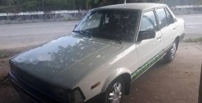 Toyota Corolla   1982 - Cần bán gấp Toyota Corolla năm sản xuất 1982, màu trắng giá 40 triệu tại Tiền Giang