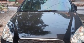 Kia Carens EXMT 2016 - Bán xe cũ Kia Carens EXMT đời 2016, màu đen giá 430 triệu tại Quảng Ninh