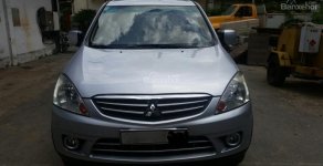 Mitsubishi Zinger GLS 2009 - Cần bán Mitsubishi Zinger GLS, màu bạc xe gia đình giá 310 triệu tại Tp.HCM