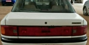 Mazda 323 1994 - Bán ô tô Mazda 323 đời 1994, màu trắng giá 45 triệu tại Hòa Bình