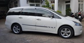 Mitsubishi Grandis 2.4 AT 2011 - Mình cần bán xe Mitsubishi Grandis đời 2011, màu trắng, xe đi ít nên còn rất đẹp giá 600 triệu tại Tp.HCM