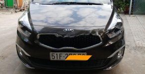 Kia Rondo AT 2015 - Bán xe Kia Rondo At sản xuất 2015, màu nâu, xe đẹp một đời chủ còn cực mới giá 545 triệu tại Tp.HCM