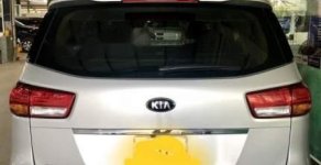Kia Sedona AT 2014 - Bán xe Kia Sedona AT đời 2014, màu bạc số tự động, giá chỉ 955 triệu giá 955 triệu tại Tp.HCM